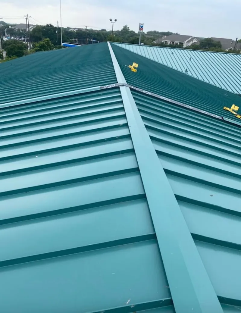 Green commercial metal roof ridge and valley for Metal Roof Repair in Ladera Ranch